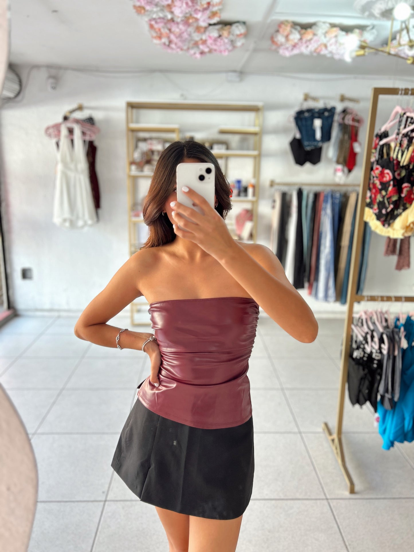Top guinda piel